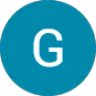 Circular teal icon with a white letter G in the center.